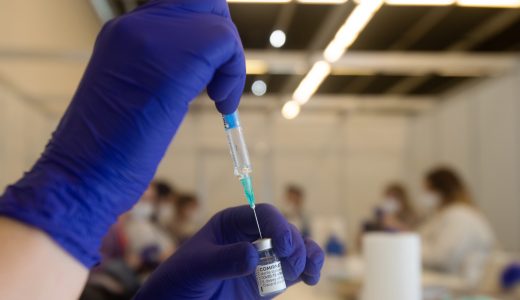 An employee prepares Comirnaty Corona Virus vaccine from BionTech / Pfizer in the Austria Center Vienna in Vienna on April 02, 2021. The Austria Center is Austria's largest vaccination center